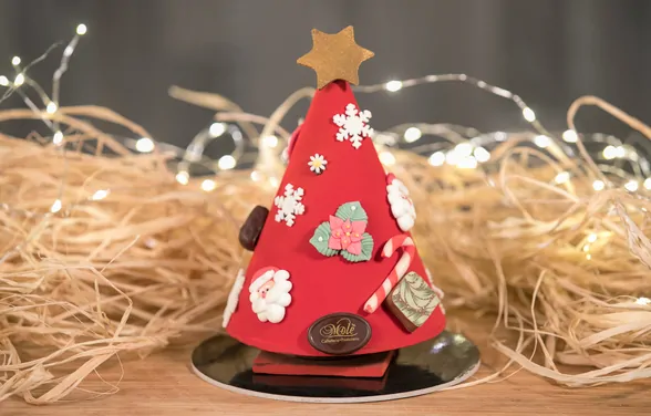 Albero di cioccolato su base decorata